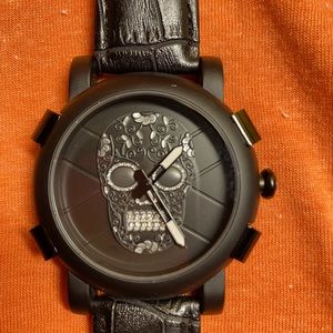 SKONE brand men/women’s wrist watch.